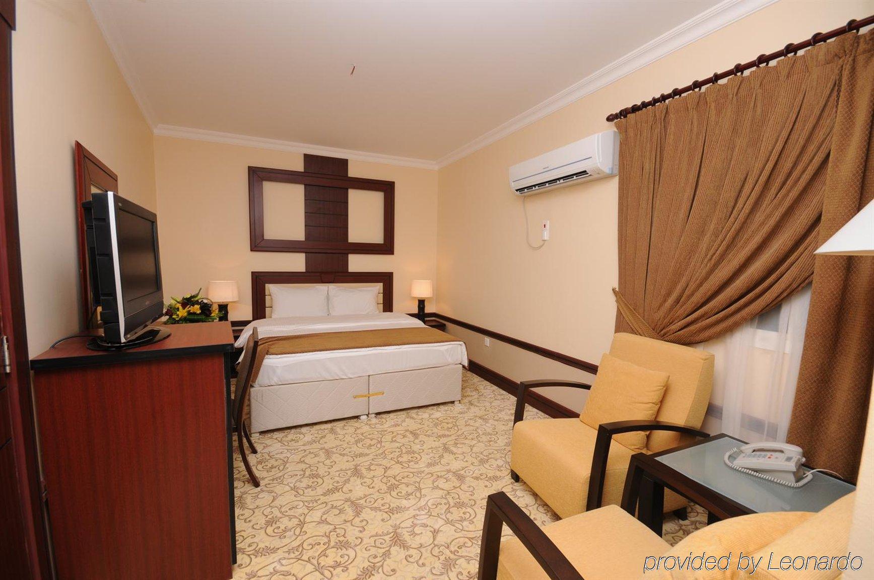 La Villa Palace Hotel Doha Værelse billede
